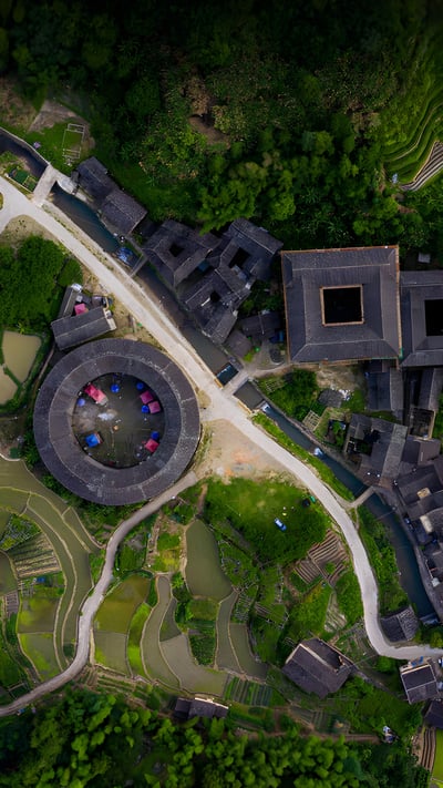 Fujian Tulou complex of historical and cultural heritage buildings in Fujian province, China (© Hongjie Han/Getty Images) mobile wallpaper