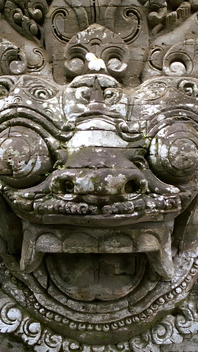 Stone carving at a temple in Ubud, Bali, Indonesia (© R. Schönebaum/plainpicture) mobile wallpaper