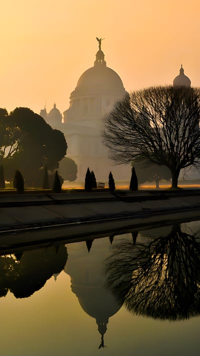 Beautiful foggy winter sunrise at Victoria Memorial, Kolkata, India. (© DebashisK/Shutterstock) mobile wallpaper