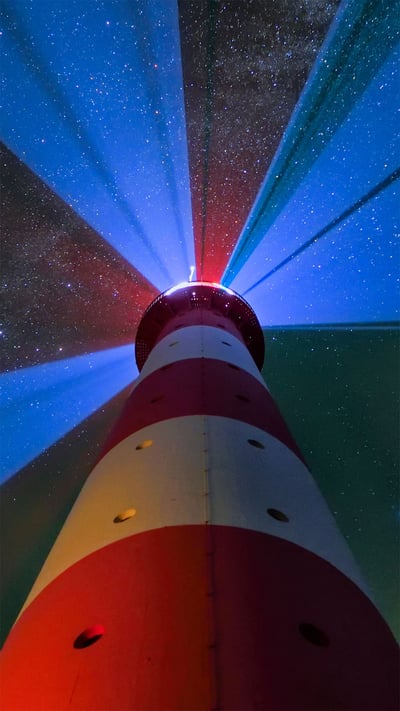 Westerheversand Lighthouse in Westerhever, Germany (© Sandra Bartocha/Minden Pictures) mobile wallpaper